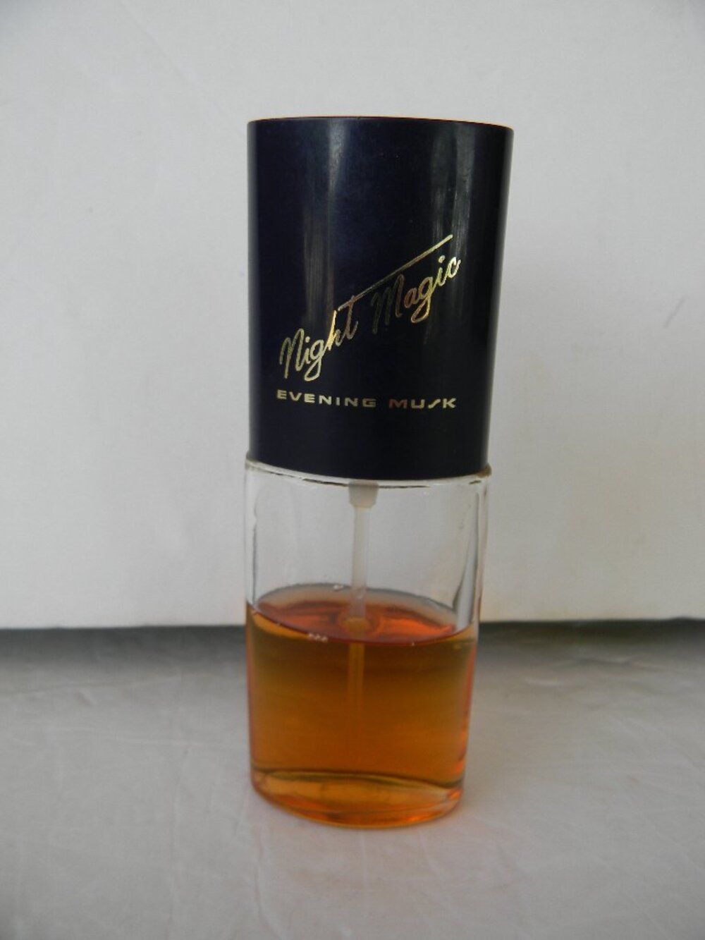 VINTAGE AVON NIGHT MAGIC EVENING MUSK 1 FL OZ SPRAY PARFUM 60% FULL